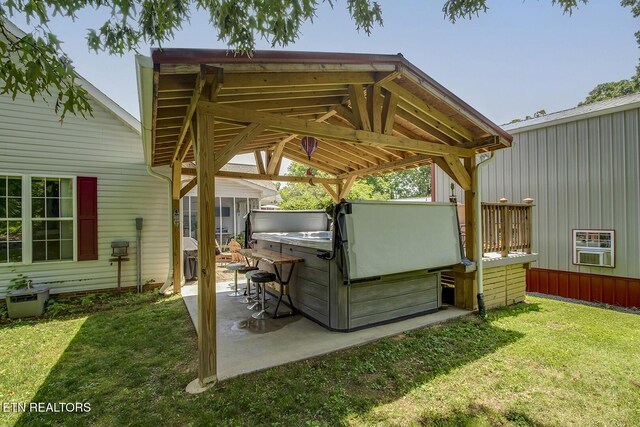 111 Ellis St, Vonore, TN 37885 - view of patio with a hot tub