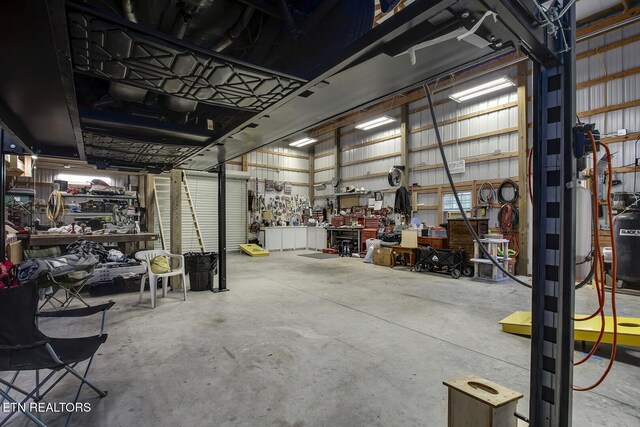 111 Ellis St, Vonore, TN 37885 - garage with a workshop area