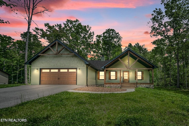 191 Creekview Ct, Jamestown, TN 38556 - craftsman inspired home with driveway, an attached garage, a lawn, and a porch