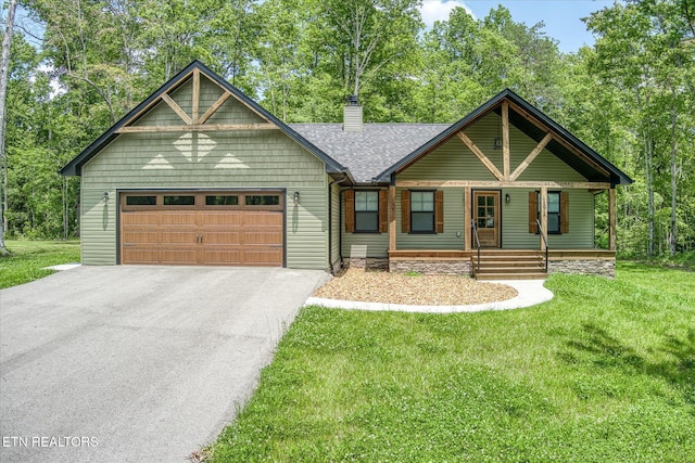 191 Creekview Ct, Jamestown, TN 38556 - view of front of house featuring a chimney, a porch, asphalt driveway, roof with shingles, and a front yard