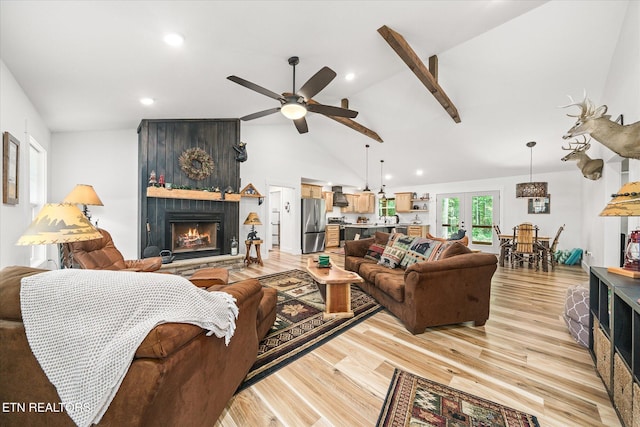 191 Creekview Ct, Jamestown, TN 38556 - living room with a fireplace, a ceiling fan, light wood finished floors, high vaulted ceiling, and beam ceiling