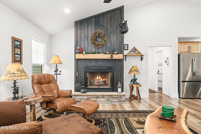 191 Creekview Ct, Jamestown, TN 38556 - living area with lofted ceiling, a fireplace, light wood finished floors, baseboards, and recessed lighting