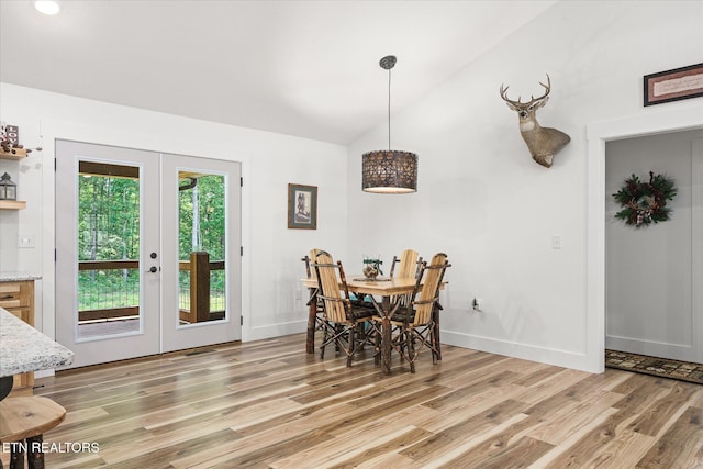 191 Creekview Ct, Jamestown, TN 38556 - dining space with french doors, light wood finished floors, lofted ceiling, and baseboards