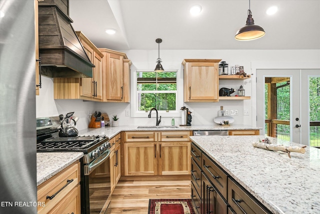 191 Creekview Ct, Jamestown, TN 38556 - kitchen with stainless steel appliances, a sink, premium range hood, light wood-style flooring, and healthy amount of natural light