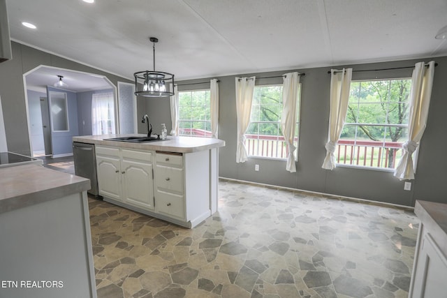 641 W Fork Rd, Loudon, TN 37774 - kitchen featuring a sink, stainless steel dishwasher, white cabinets, light stone finish floors, and a chandelier