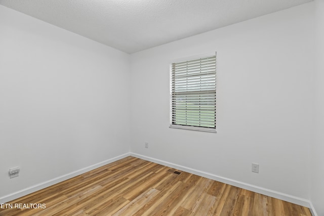 321 Ailey Rd, Dandridge, TN 37725 - unfurnished room featuring baseboards and light wood-type flooring