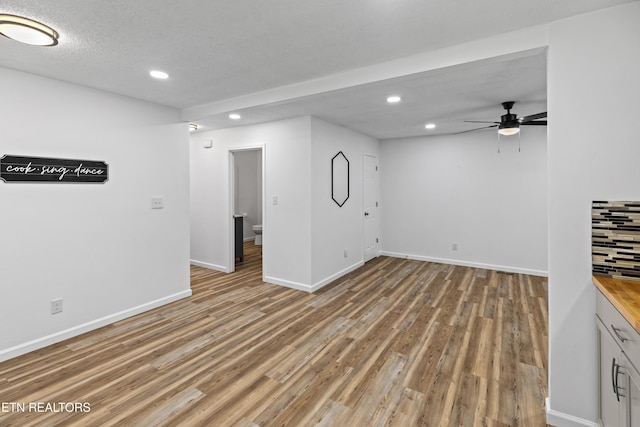 321 Ailey Rd, Dandridge, TN 37725 - below grade area featuring recessed lighting, ceiling fan, light wood-style flooring, and baseboards