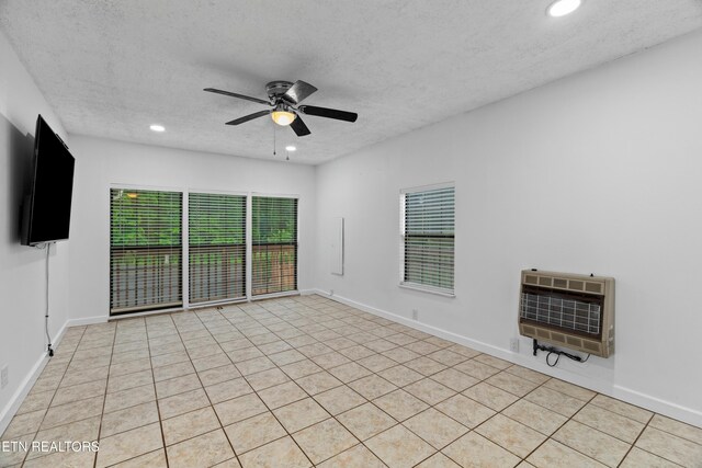 321 Ailey Rd, Dandridge, TN 37725 - spare room with heating unit, ceiling fan, a textured ceiling, recessed lighting, and baseboards