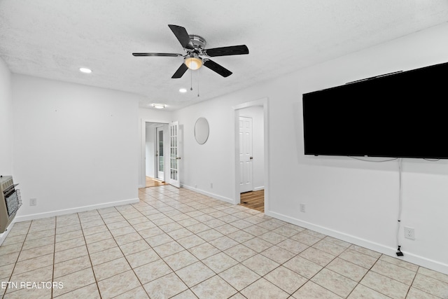321 Ailey Rd, Dandridge, TN 37725 - unfurnished living room with ceiling fan, recessed lighting, baseboards, and light tile patterned floors