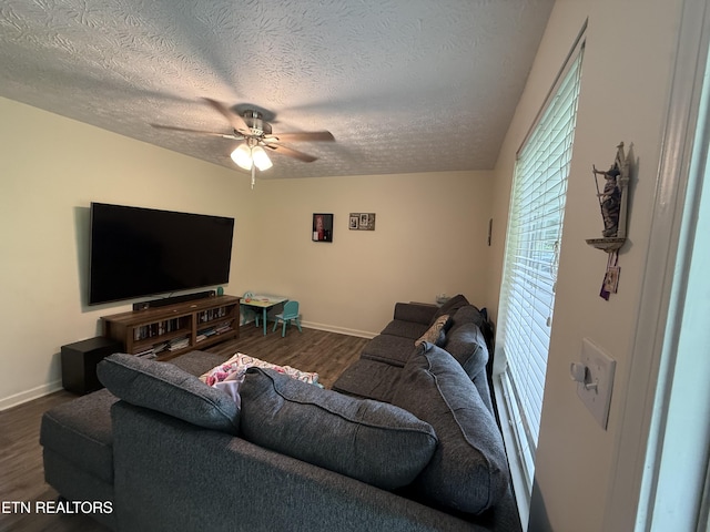 1517 W Copeland Dr, Powell, TN 37849 - living area featuring dark wood-type flooring, a textured ceiling, baseboards, and ceiling fan
