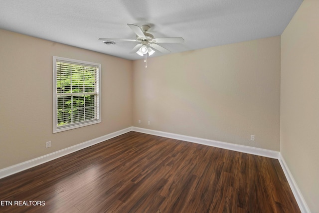 4411 Waldon Pond, Corryton, TN 37721 - unfurnished room featuring ceiling fan, dark wood finished floors, and baseboards