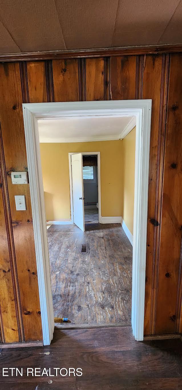 378 Church St, Jellico, TN 37762 - hallway featuring baseboards and wood finished floors