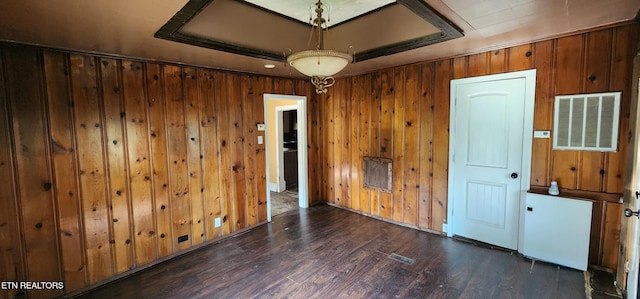 378 Church St, Jellico, TN 37762 - unfurnished room with dark wood finished floors and wooden walls