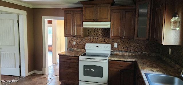 378 Church St, Jellico, TN 37762 - kitchen featuring white range with electric cooktop, under cabinet range hood, backsplash, glass insert cabinets, and ornamental molding