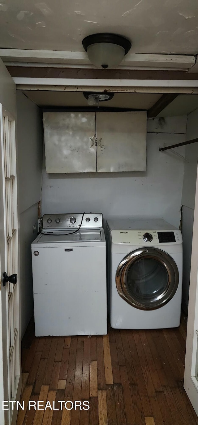 378 Church St, Jellico, TN 37762 - laundry room with cabinet space, independent washer and dryer, and dark wood-type flooring