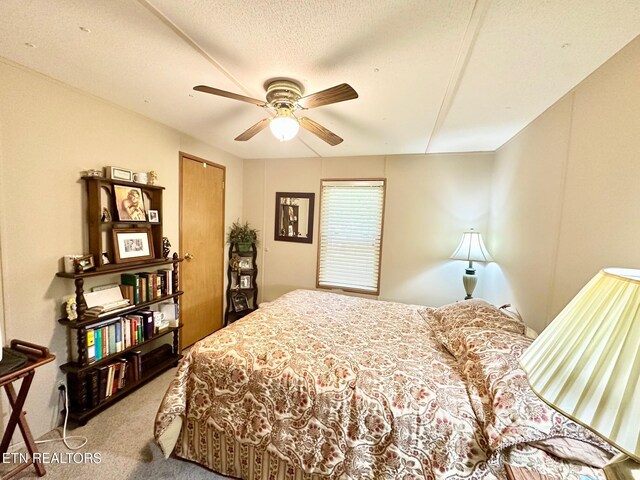 138 Rugby Ct, Crossville, TN 38558 - bedroom featuring carpet, ceiling fan, and a textured ceiling
