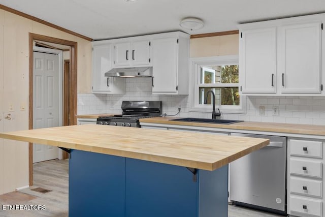 1477 Womac Hollow Rd, Ten Mile, TN 37880 - kitchen featuring wood counters, stainless steel dishwasher, stove, a sink, and crown molding