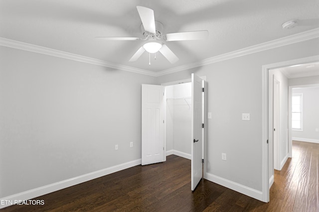 6305 Glen Eagle Ln, Knoxville, TN 37921 - unfurnished bedroom with dark wood-style floors, crown molding, baseboards, a ceiling fan, and a closet