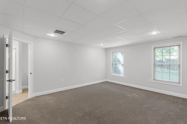 6305 Glen Eagle Ln, Knoxville, TN 37921 - empty room with dark carpet, a drop ceiling, and baseboards