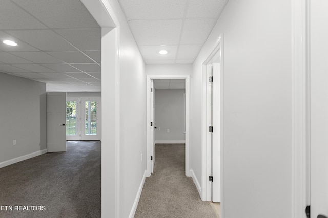 6305 Glen Eagle Ln, Knoxville, TN 37921 - hallway with a drop ceiling, light colored carpet, baseboards, recessed lighting, and french doors