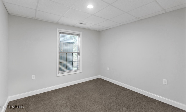 6305 Glen Eagle Ln, Knoxville, TN 37921 - empty room featuring dark carpet, a drop ceiling, and baseboards