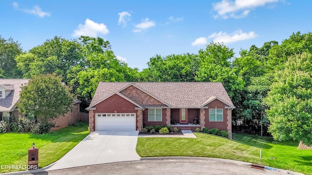 6305 Glen Eagle Ln, Knoxville, TN 37921 - single story home with brick siding, a garage, driveway, a front yard, and a shingled roof