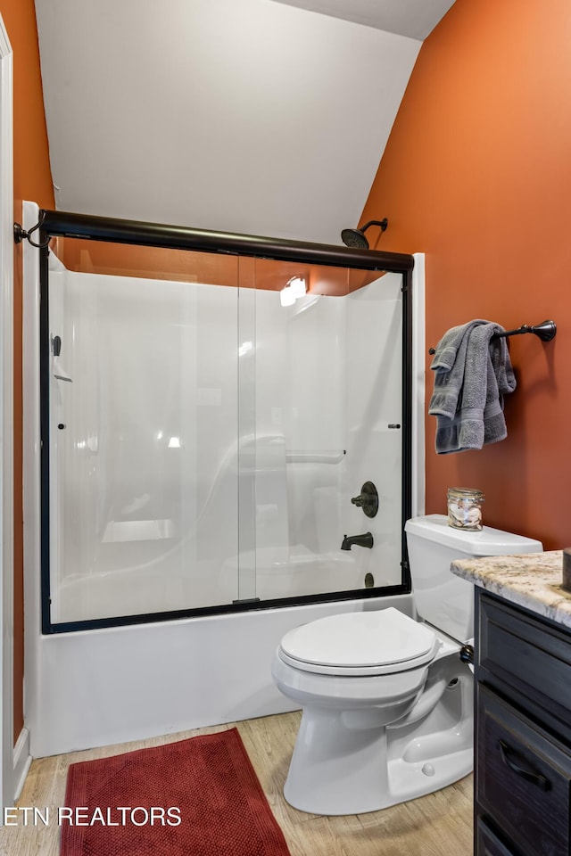 12912 Long Ridge Rd, Knoxville, TN 37934 - full bathroom featuring bath / shower combo with glass door, vanity, toilet, wood finished floors, and lofted ceiling
