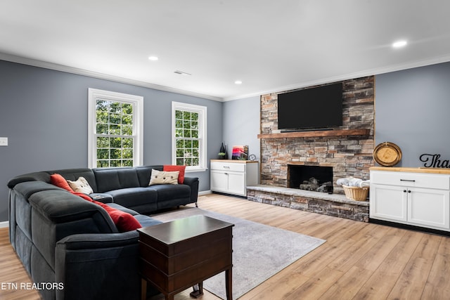 12912 Long Ridge Rd, Knoxville, TN 37934 - living area featuring ornamental molding, a stone fireplace, light wood-style floors, baseboards, and recessed lighting