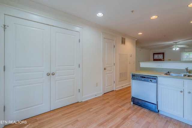 3950 Cherokee Woods Way Unit 105, Knoxville, TN 37920 - kitchen with dishwasher, a sink, light wood-style flooring, crown molding, and baseboards