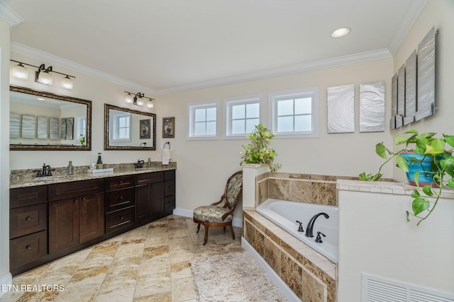 3210 Gazebo Point Way, Knoxville, TN 37920 - full bathroom featuring double vanity, a garden tub, ornamental molding, and baseboards