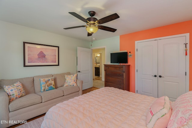 3210 Gazebo Point Way, Knoxville, TN 37920 - bedroom with a closet, wood finished floors, and a ceiling fan