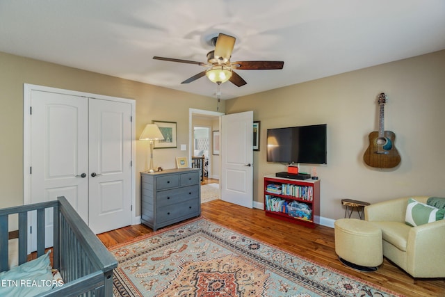 3210 Gazebo Point Way, Knoxville, TN 37920 - bedroom featuring a closet, wood finished floors, baseboards, and ceiling fan