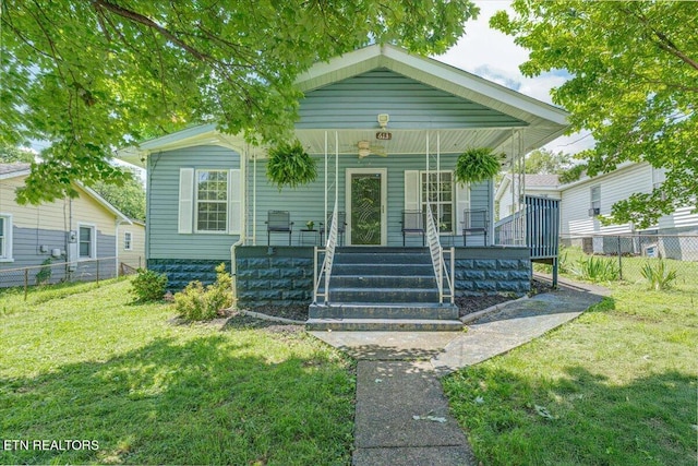 613 Victory St, Knoxville, TN 37919 - shotgun-style home with covered porch