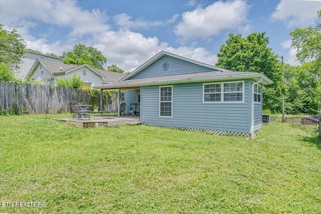 613 Victory St, Knoxville, TN 37919 - back of house featuring a patio
