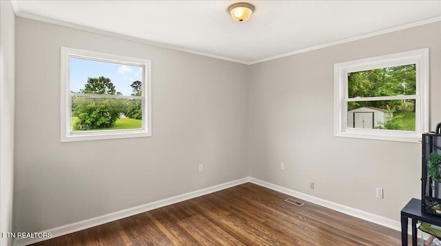 321 Sunrise Dr, Kingston, TN 37763 - unfurnished room with baseboards, plenty of natural light, dark wood-type flooring, and ornamental molding