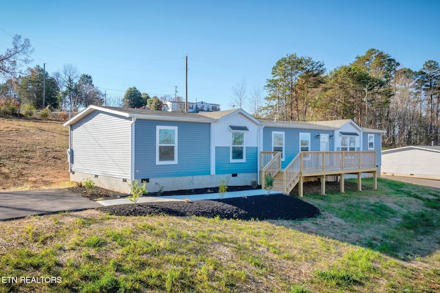 4501 Shipe Rd, Corryton, TN 37721 - rear view of property featuring crawl space, a deck, and a yard