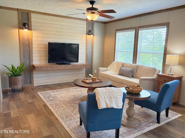 4501 Shipe Rd, Corryton, TN 37721 - living area featuring a ceiling fan, wood finished floors, and a textured ceiling