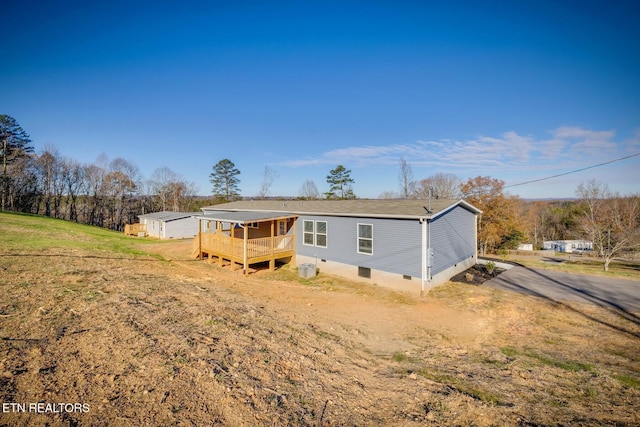 4501 Shipe Rd, Corryton, TN 37721 - back of property with a wooden deck