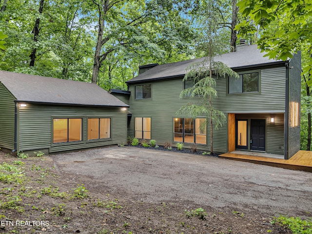 9501 E Aiken Ln, Knoxville, TN 37922 - rear view of house with a chimney and roof with shingles