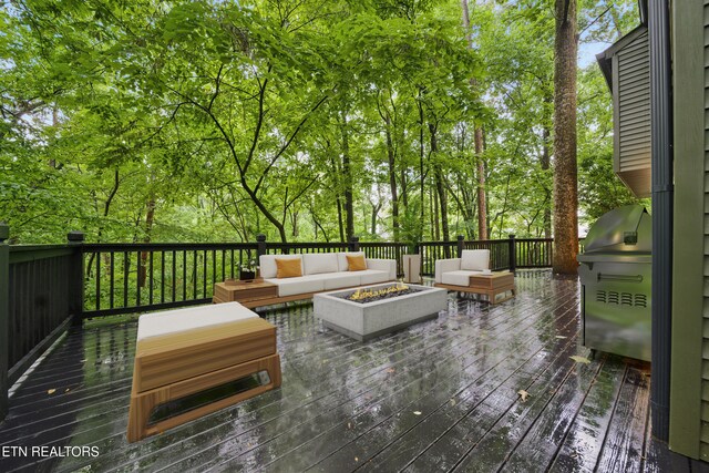 9501 E Aiken Ln, Knoxville, TN 37922 - wooden terrace featuring an outdoor living space with a fire pit and grilling area