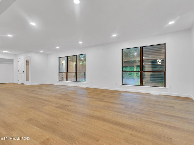 9501 E Aiken Ln, Knoxville, TN 37922 - unfurnished room with light wood-style flooring, recessed lighting, and baseboards