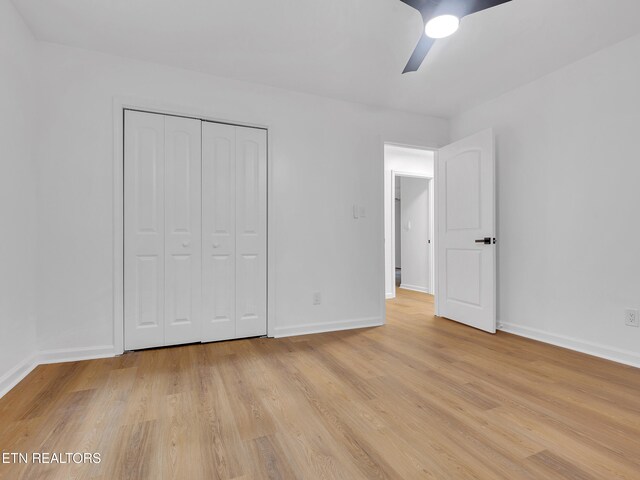 9501 E Aiken Ln, Knoxville, TN 37922 - unfurnished bedroom with light wood-style floors and baseboards