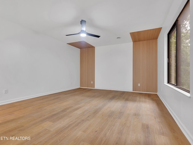 9501 E Aiken Ln, Knoxville, TN 37922 - empty room with ceiling fan and light wood-style flooring
