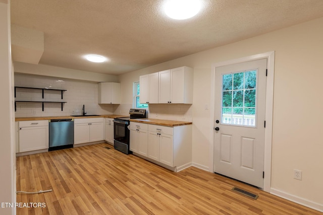 2800 Boyds Bridge Pike, Knoxville, TN 37914 - kitchen with electric stove, dishwashing machine, butcher block countertops, a sink, and open shelves