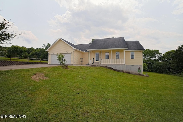 773 Harvest Meadows Dr, Kodak, TN 37764 - view of front of home with a porch, driveway, a front lawn, and a garage