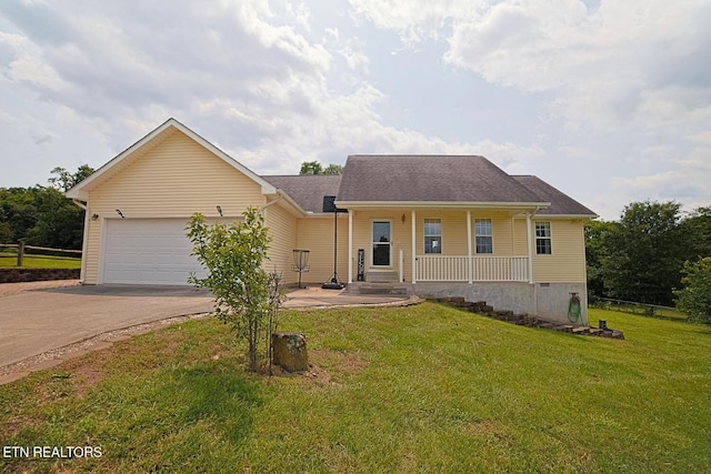 773 Harvest Meadows Dr, Kodak, TN 37764 - view of front of home featuring driveway, a porch, a garage, and roof with shingles