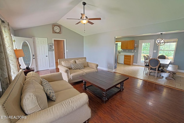 773 Harvest Meadows Dr, Kodak, TN 37764 - living area featuring ceiling fan, light wood finished floors, vaulted ceiling, and baseboards