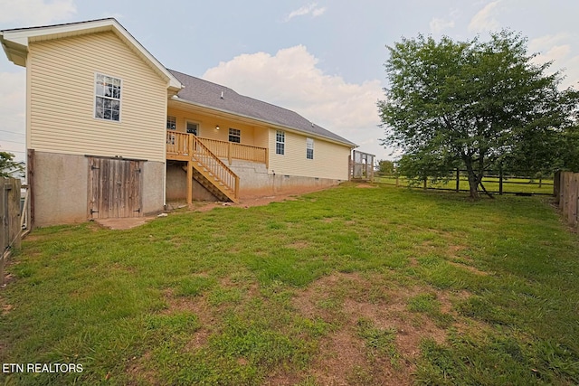 773 Harvest Meadows Dr, Kodak, TN 37764 - rear view of house with stairway, a wooden deck, and crawl space