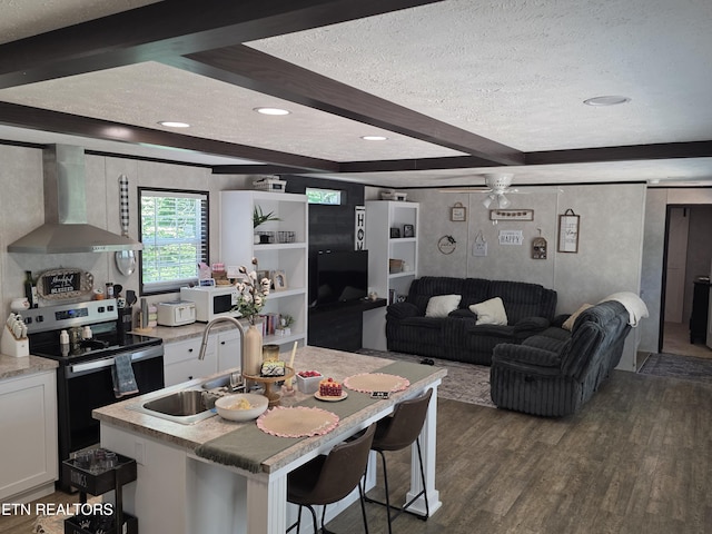 437 Clint Williams Rd, Rutledge, TN 37861 - kitchen featuring electric range, wall chimney range hood, a textured ceiling, dark wood-type flooring, and beamed ceiling