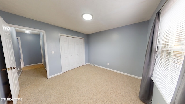 103 Mayfield Dr Unit 5, Elizabethton, TN 37643 - unfurnished bedroom with carpet floors, a closet, and baseboards